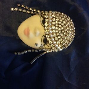 Porcelain pin with rhinestones